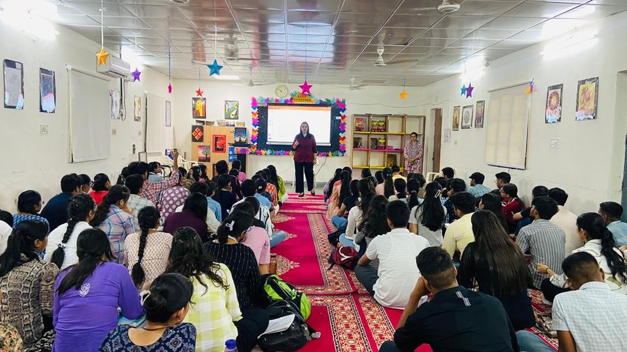 A full hall of students at a career guidance session